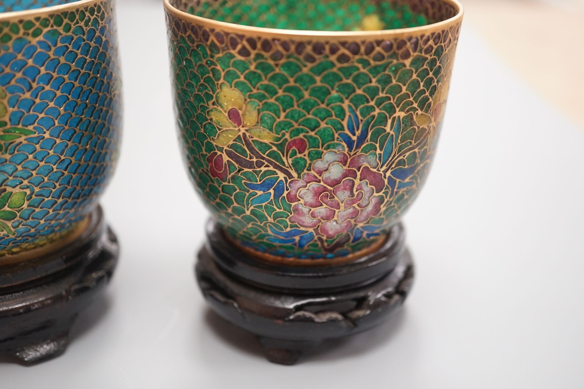 A pair of Chinese plique-a-jour cups (cased)